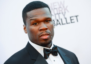 FILE - This Sept. 19, 2013 file photo shows Curtis "50 Cent" Jackson at the New York City Ballet 2013 Fall gala at Lincoln Center in New York. 50 Cent thinks the recent blockbuster deal between Beats by Dre and Apple only helps his headphone company. The rapper unveiled the latest line in SMS Audio at an event on Wednesday, June 18, 2014, with New York Knicks star Carmelo Anthony, a new pitchman and investor. (Photo by Evan Agostini/Invision/AP, File) ORG XMIT: NYET325